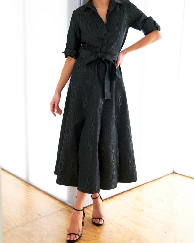 Front of a model wearing a size XL Laine Moire Jacquard Dress In Black in Black by Finley. | dia_product_style_image_id:346418